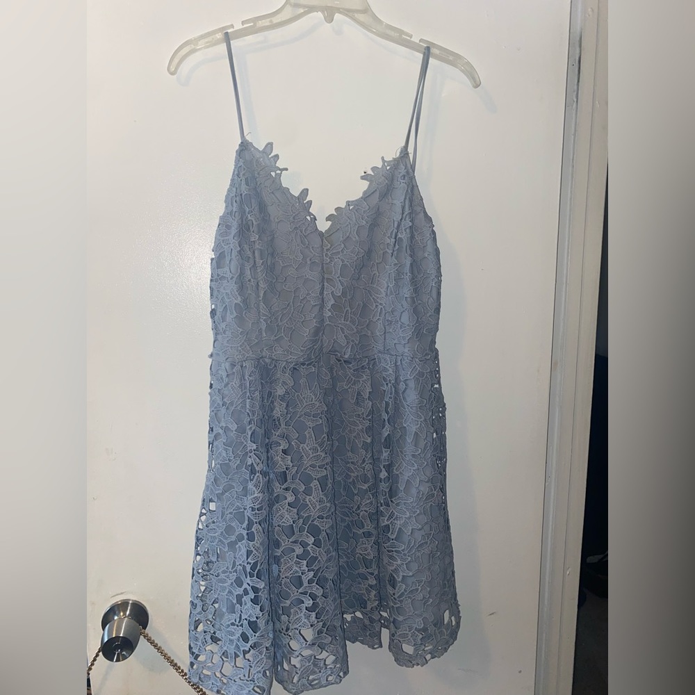 Brand new, only worn once. XL but runs small!